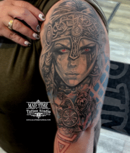 viking girl tattoo black and gray half sleeve