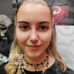 36Professional Piercing Liverpool home new ognialna zagubiona 36 kafelkow Professional bridge piercing showcase by Mad Time Tattoo Studio, featuring a straight titanium barbell on the bridge of the nose, paired with a spiked gothic septum clicker ring and a vertical eyebrow piercing on a female client.