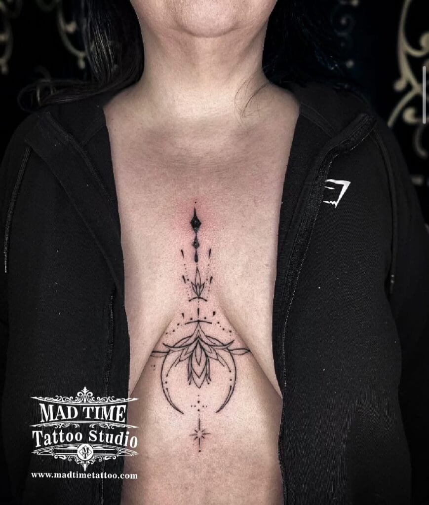 Symmetrical fine line sternum tattoo featuring an abstract ornamental crystal and drop design.