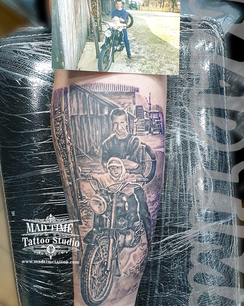 Custom photo realism tattoo replicating an old vintage photograph of a father and son on a classic motorcycle by Henry at our studio