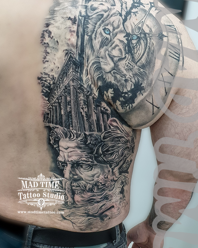 Large scale back and shoulder black and grey realism tattoo featuring the god Zeus Greek temple columns and a blue-eyed lion clock face by Henry at our studio